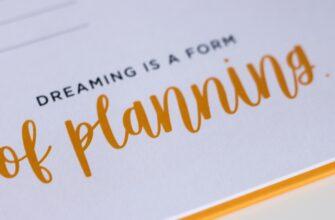 a close up of a piece of paper with writing on it